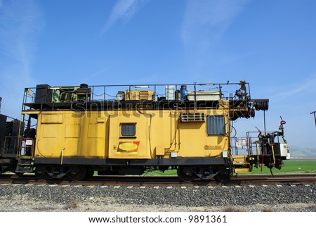The caboose/office of a track grinding train which grinds rails to provide longer service life