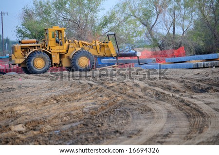 Heavy equipment is utilized on a construction job site