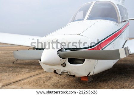 Nose wheel collapse resulted in extensive propeller and engine damage to light plane