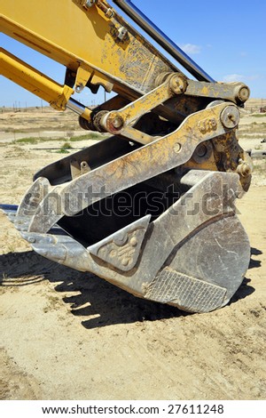 The business end of power equipment used for excavating and trenching on construction job sites