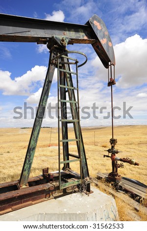 An abandoned oil well pumping unit in California symbolizes the diminishing oil reserves world wide