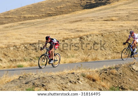 BAKERSFIELD, CA - JUNE 7: Racing in the mountains, Mens\' 30+ category, Golden Empire Classic professional bicycle road race championships, June 7, 2009, Bakersfield, CA