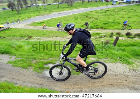 BAKERSFIELD, CA - FEB 21: Rain and mud during the Foothill Classic Mountain Bike Race did not deter contestants on February 21, 2010, in Bakersfield, CA