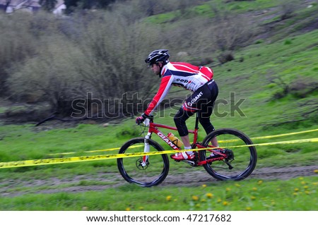 BAKERSFIELD, CA - FEB 21: Rain and mud during the Foothill Classic Mountain Bike Race did not deter contestants on February 21, 2010, in Bakersfield, CA