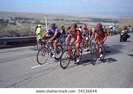 BAKERSFIELD, CA - MAY 20: A group of cyclists pushes up the last hill toward the finish of Stage 5, Amgen Tour of California on May 20, 2010, at Bakersfield, California.