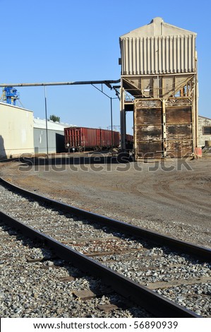 Railroad freight car awaits loading at an agricultural products plant