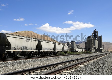 Railroad Cars Line Up To Be Loaded At California Cement Manufacturing