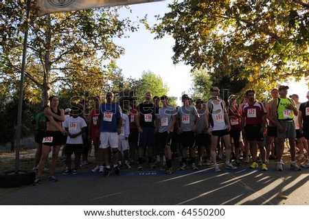 BAKERSFIELD, CA - NOV 6: Unidentified contestants line up at the start prior to the 28th Annual Police memorial Run on November 6, 2010, at Bakersfield, California.