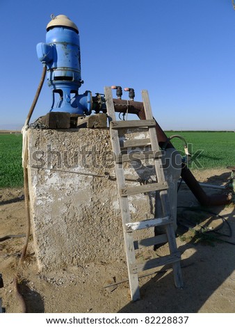 Irrigation pump for portable irrigation piping in a California farm field