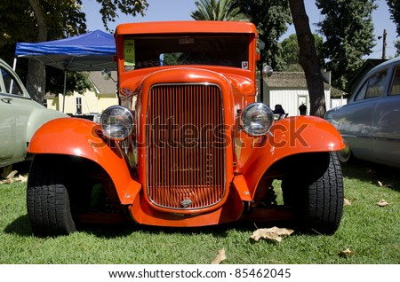BAKERSFIELD, CA - SEP18: The Kern County Museum Auto Show features classic automobiles, among them this orange Ford-based pickup, on display September 18, 2011, in Bakersfield, California.