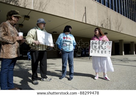 BAKERSFIELD, CA -NOV 5: A scheduled Occupy Wall Street demonstration attracts only four unidentified stalwart people in this politically conservative area on November 5, 2011 in Bakersfield, California.
