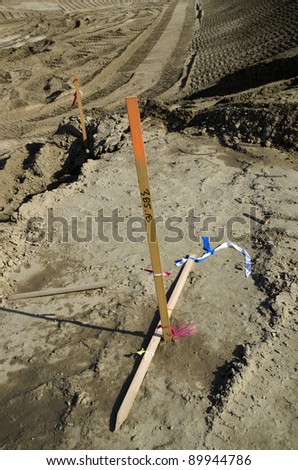 Survey stakes are used to mark lines and grades on a major construction project