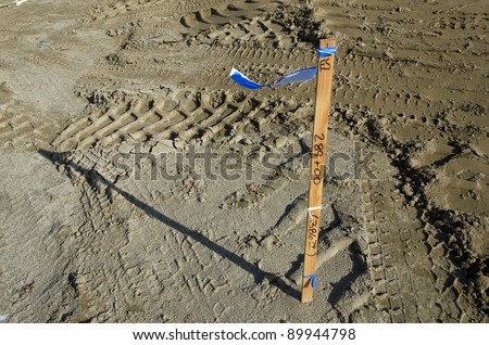 Survey stakes are used to mark lines and grades on a major construction project