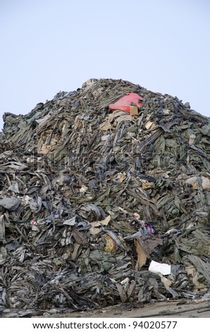A huge pile of mixed refuse at a recycling center