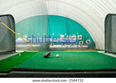 Wide angle view from a driving range stall.