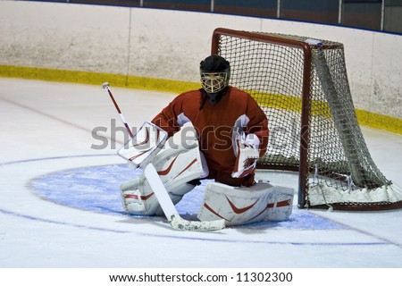 Hockey goalie playing in competition with intensity