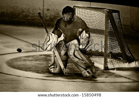 Hockey goalie making a save during a game