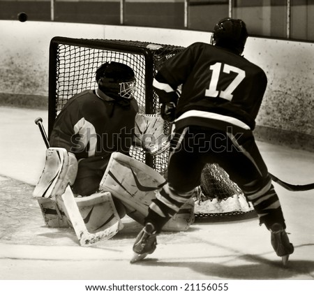 Hockey goalie making a save during a game