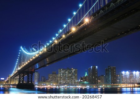 Manhattan Bridge and Manhattan skyline At Night Lights, NYC