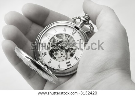 holding old clock, black and white