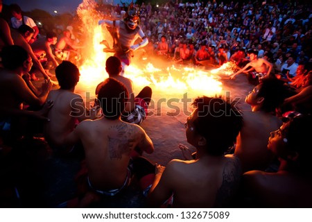 BALI DECEMBER 30 traditional Balinese Kecak and Fire dance at Uluwatu Temple on dec 30 2012 Bali Indonesia BALI DECEMBER 30 traditional Balinese Kecak and Fire dance at Uluwatu Temple on dec 30 2012 Bali Indonesia