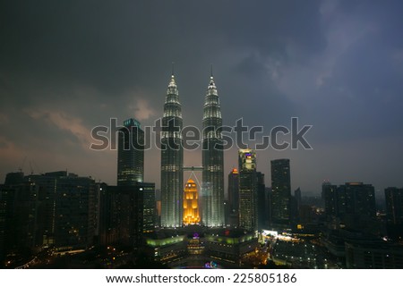 KUALA LUMPUR, MALAYSIA - CIRCA FEB 2014: Nightscape of Petronas Twin Towers. Petronas Twin Towers were the tallest buildings (452m) in the world during 1998-2004.