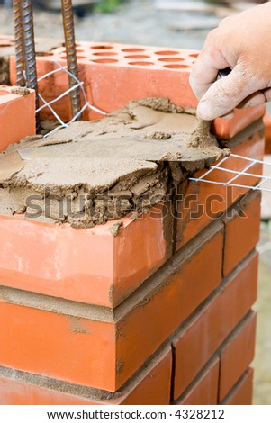 Construction. Bricks laying.