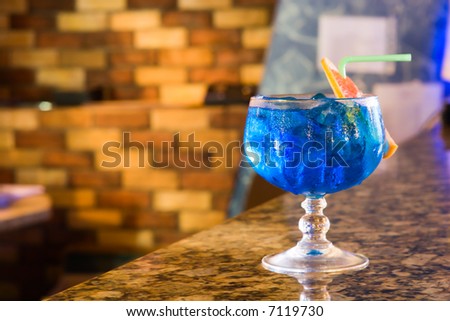 Cocktail with ice shards in a wet goblet