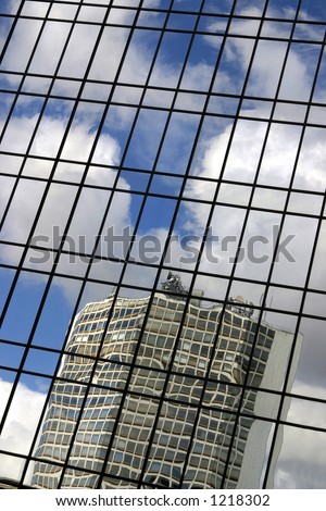 Office building reflected in windows of Hyatt Hotel Birmingham UK