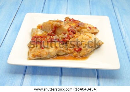 Cod with tomato and vegetable sauce
