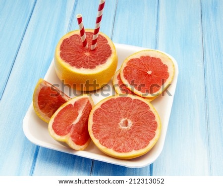 Fresh red grapefruit cut into pieces