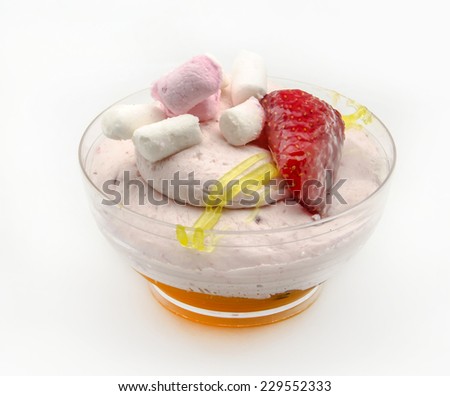 Mousse cold whipping cream with jam and fruit