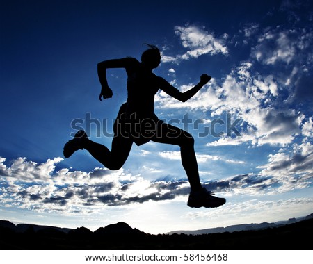 Silhouette of a runner with a beautiful sky in the background