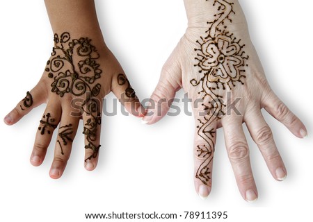Henna Hand Tattoos on Two Female Hands Of Different Human Races And Ages  With Henna Tattoos