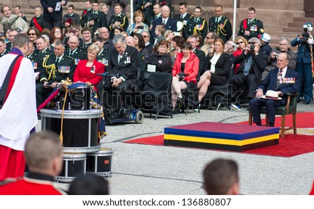 TORONTO-APRIL 27: Prince Philip, Duke of Edinburgh presents new Colours to The Royal Canadian Regiment. Canada celebrates the 200 anniversary of The Battle of York; as seen in Toronto April 27, 2013