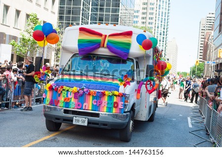 TORONTO - JUNE 30, 2013:  33rd Pride Parade which celebrates the history, courage, diversity and future of the Lesbian, Gay, and Bisexual  Allies as seen on June 30, 2013 in Toronto, Canada