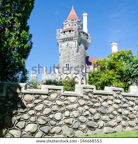 TORONTO-JULY 13: Casa Loma is one of Toronto's top ten tourist attractions. Around 300,000 visitors tour Casa Loma and the Estate Gardens each year. As seen on July 13, 2013 in Toronto, Canada