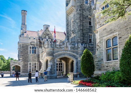 TORONTO-JULY 13: Casa Loma is one of Toronto\'s top ten tourist attractions. Around 300,000 visitors tour Casa Loma and the Estate Gardens each year. As seen on July 13, 2013 in Toronto, Canada