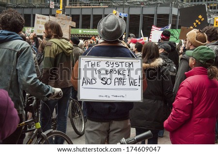 TORONTO, OCTOBER 22, 2011: Occupy Toronto is part of the Occupy movement, which protests against economic inequality, corporate greed, and the influence of corporations and lobbyists on government.
