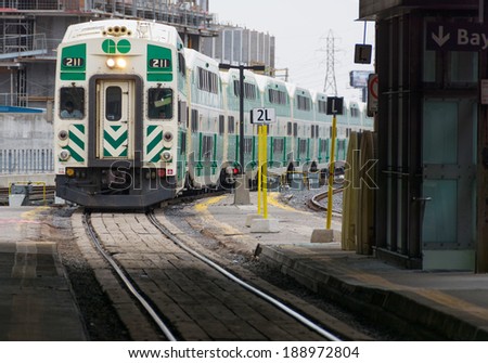 TORONTO,CANADA-APRIL,18,2014: GO Transit belongs to Metrolinx and it is an inter-regional public transit system. GO carried 65.5 million passengers in 2012, and its ridership continues to grow.