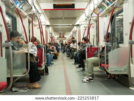 TORONTO,CANADA-OCTOBER 2,2014: Inside the new TTC subway trains. The Toronto Transit Commission (TTC) is a public transport agency that operates bus, streetcar, and rapid transit services in Toronto.