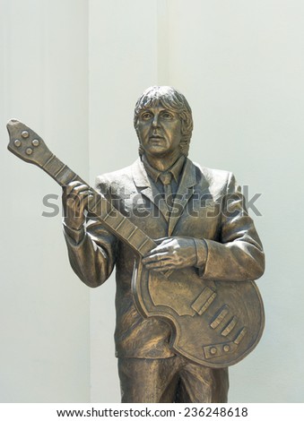 TRINIDAD,CUBA-JULY 22,2014:Statue honoring The Beatles in the Music House. The Beatles were censured in Cuba and after a rectification nowadays they are honored by the goverment