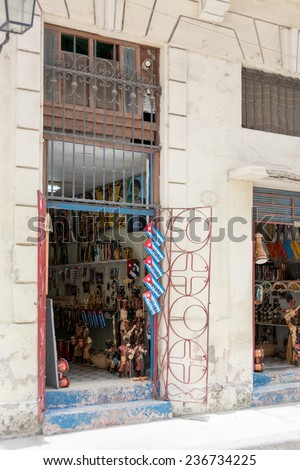 HAVANA,CUBA-JULY 17,2014: House door leading to a living room that is actually a souvenir store for tourist in Old Havana. After economic reforms Cubans are allowed to have small private business.