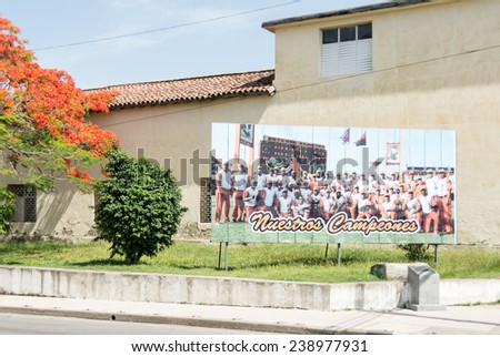 SANTA CLARA,CUBA-JULY 12,2014: Billboard with baseball team Villa Clara. Baseball is the National Sport and a celebration in each province that gets good results in the championship.