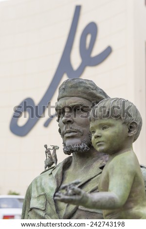 SANTA CLARA,CUBA-JULY 19,2014: Che Guevara statue or monument outside the Communist Party Headquarters in the city. The monument was designed by Jose Delarra, nowadays is a tourist landmark.