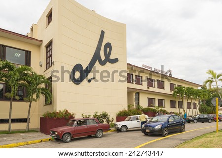 SANTA CLARA,CUBA-JULY 19,2014: Communist Pary Headquarters. All major decisions regarding the Villa Clara province are taken in this building. There is a famous Che Guevara statue in the gardens.