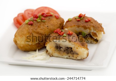 Cuban cuisine: delicious plate of stuffed potatoes made in the traditional Cuban way