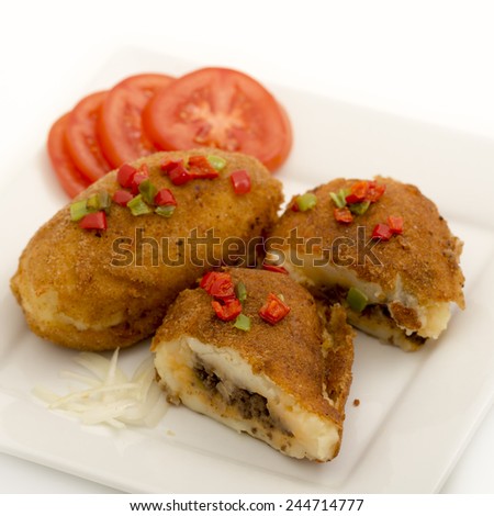 Cuban cuisine: delicious plate of stuffed potatoes made in the traditional Cuban way