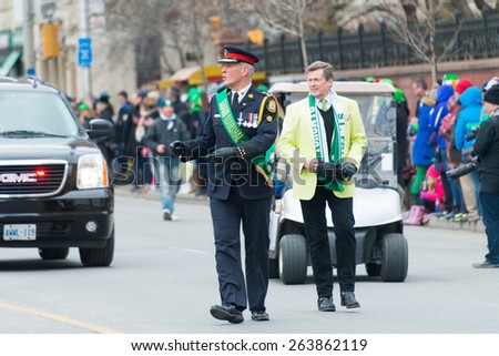 TORONTO,CANADA-MARCH 15,2015:Toronto Mayor John Tory and Chief of Police Bill Blair lead the 28th edition of the St. Patrick\'s Day Parade which is the fourth largest in the world
