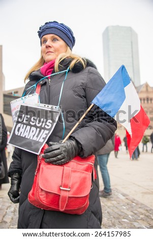 TORONTO,CANADA-JANUARY 11,2015: Toronto people meets in the Je Suis Charlie vigil at Nathan Phillips Square to honor the victims of the Charlie Hebdo magazine and protest against terrorism.